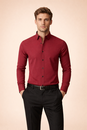 Slim-fit long-sleeve button-up shirt with a classic pointed collar, clean front button placket, smooth plain weave, tailored silhouette, and straight hem for a sharp, modern look