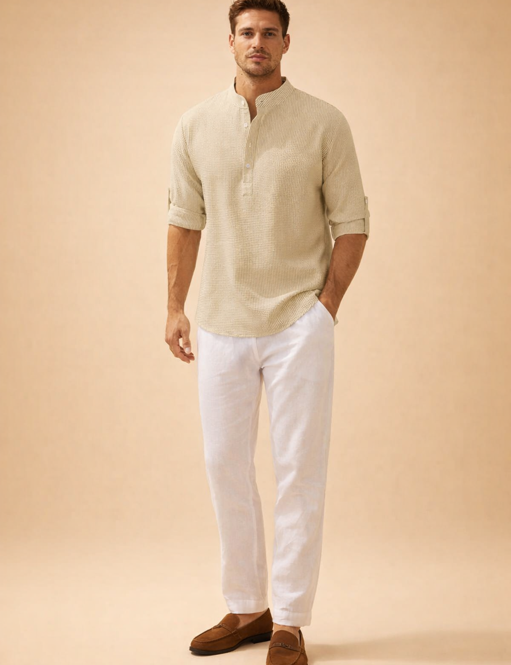 Light beige textured long-sleeve mandarin collar shirt with subtle vertical weave pattern, buttoned half placket, roll-tab sleeves, paired with crisp white tailored trousers and minimalist neutral-tone shoes for a refined casual summer outfit