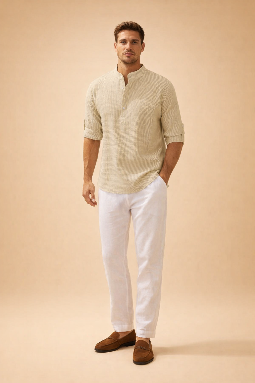 Light beige textured long-sleeve mandarin collar shirt with subtle vertical weave pattern, buttoned half placket, roll-tab sleeves, paired with crisp white tailored trousers and minimalist neutral-tone shoes for a refined casual summer outfit
