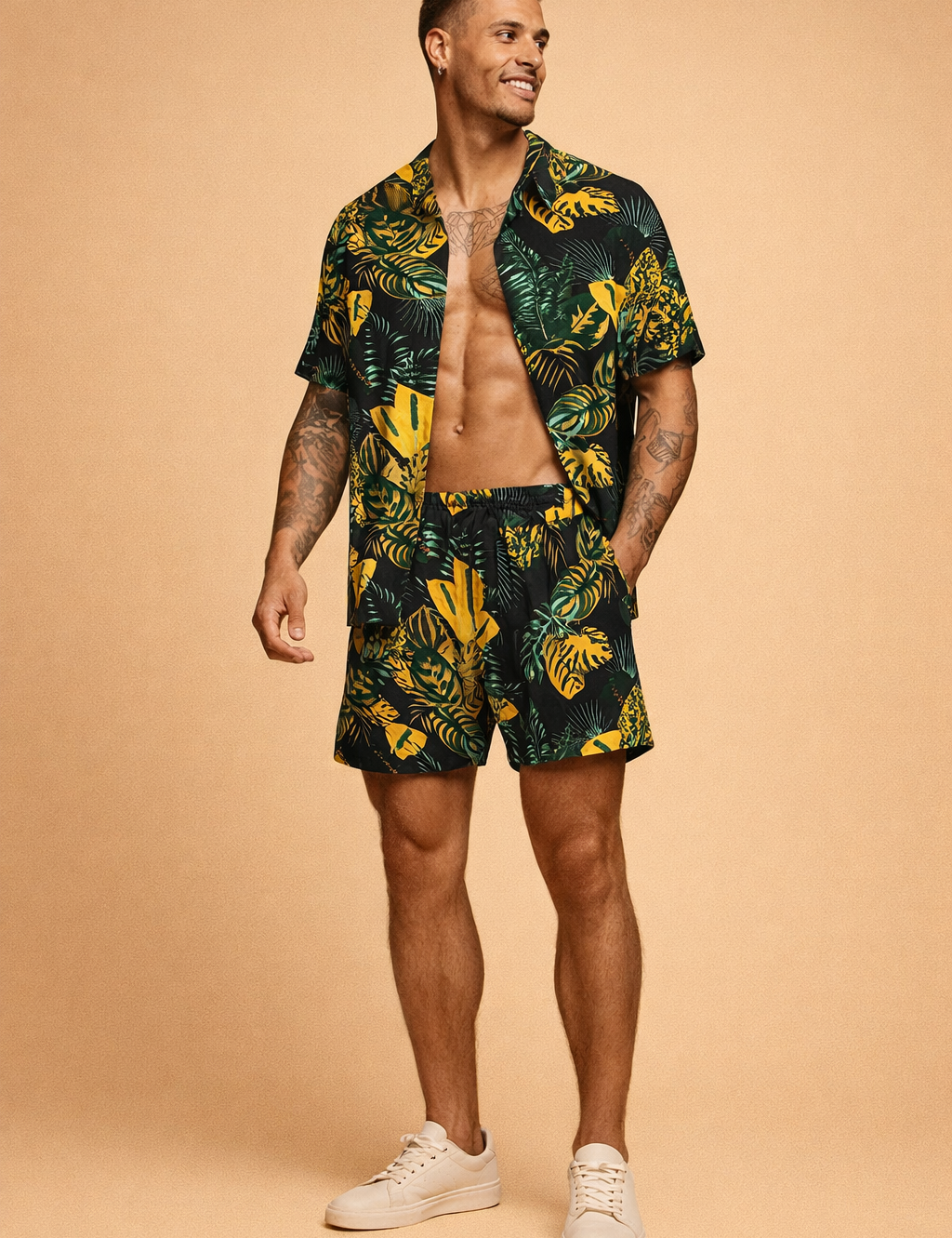 Black tropical print short-sleeve button-up shirt with matching shorts featuring green and yellow botanical leaf pattern, lightweight fabric, relaxed fit, and coordinated summer set styling paired with clean minimalist footwear
