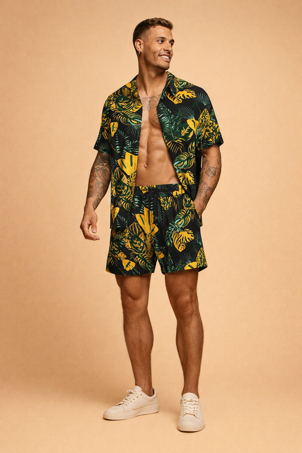 Black tropical print short-sleeve button-up shirt with matching shorts featuring green and yellow botanical leaf pattern, lightweight fabric, relaxed fit, and coordinated summer set styling paired with clean minimalist footwear