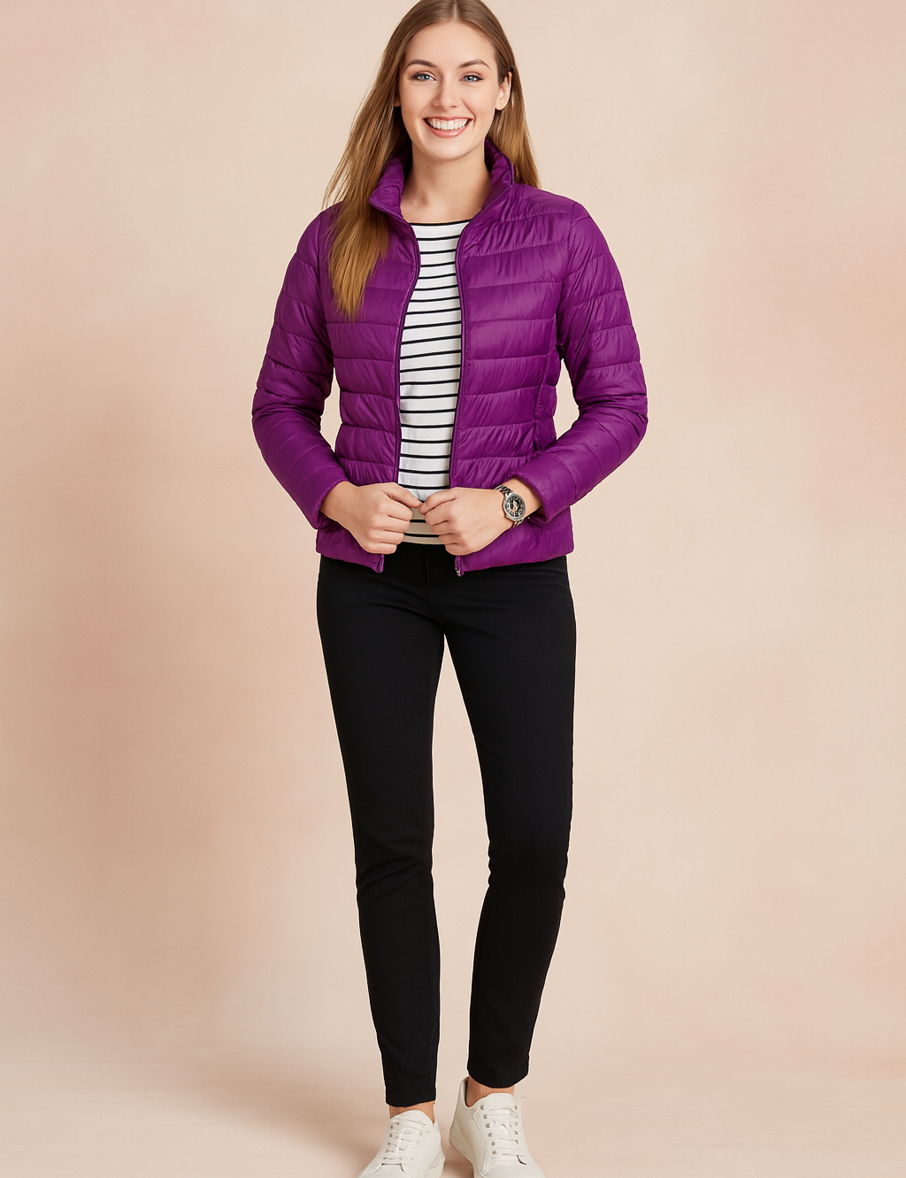 Violet quilted puffer jacket with horizontal stitching, high collar, and zip closure, styled with a striped shirt, slim black pants, and white shoe flats.