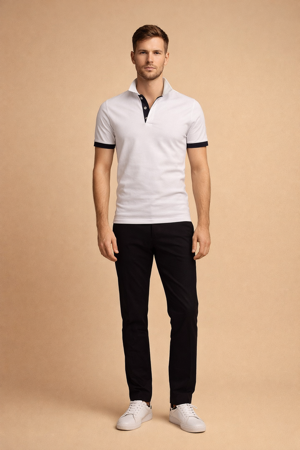 White short-sleeve polo shirt with black contrast collar and sleeve cuffs, featuring a smooth cotton fabric, solid plain weave texture, tailored slim fit, structured collar, three-button placket with black inner trim, paired with slim black trousers and clean white low-top sneakers